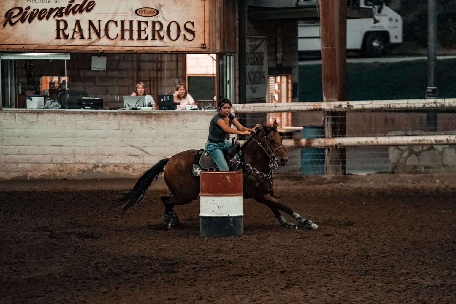 Horse and rider under the lights at a Riverside event