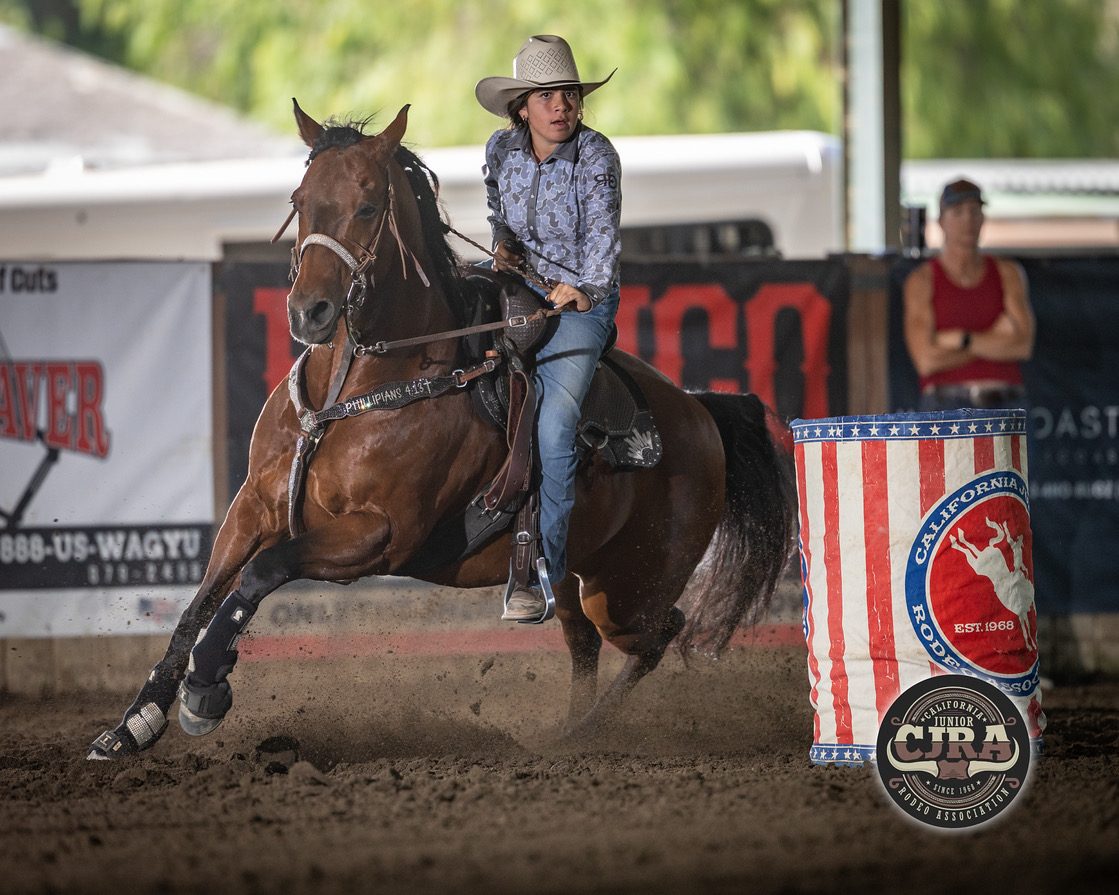 Sami running barrels on her horse at a CJRA event